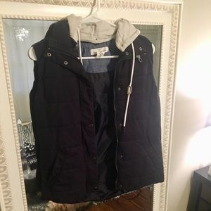 Navy vest with a hood.